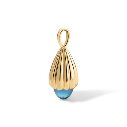 Gold elongated pendant with a voluminous fluted texture. The base is set with a vibrant blue stone. 