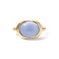 A gold ring featuring a smooth, oval-shaped light blue cabochon gemstone, presented on a clean white background with a soft shadow.