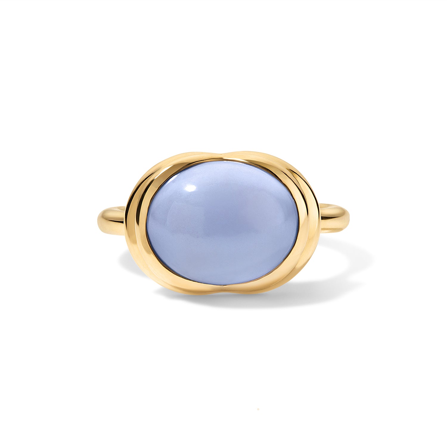 A gold ring featuring a smooth, oval-shaped light blue cabochon gemstone, presented on a clean white background with a soft shadow.